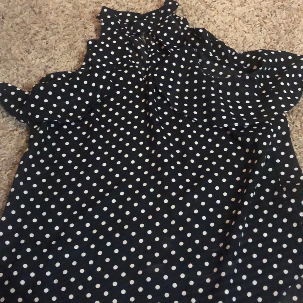 Black and white polka dotted blouse